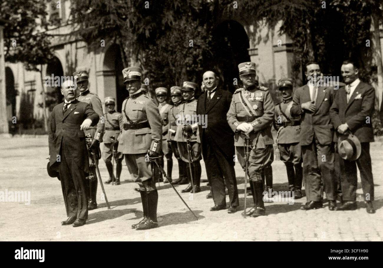 In 1926, Benito Mussolini inspects officers on a military parade ground ...