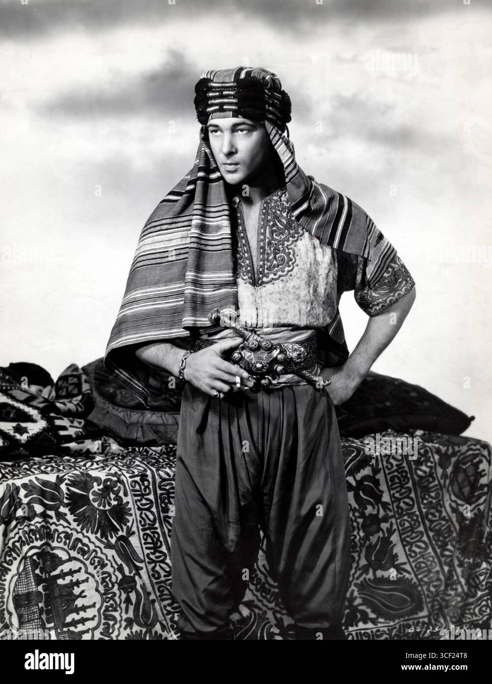 In the 1920s, film star Rudolf Valentino is dressed in an Arabic outfit ...