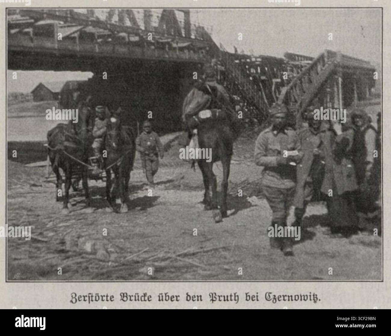 A destroyed bridge over the Prut river in Chernivtsi, as seen in 1915, during World War I, symbolizing the destruction of infrastructure during the conflict. Stock Photo