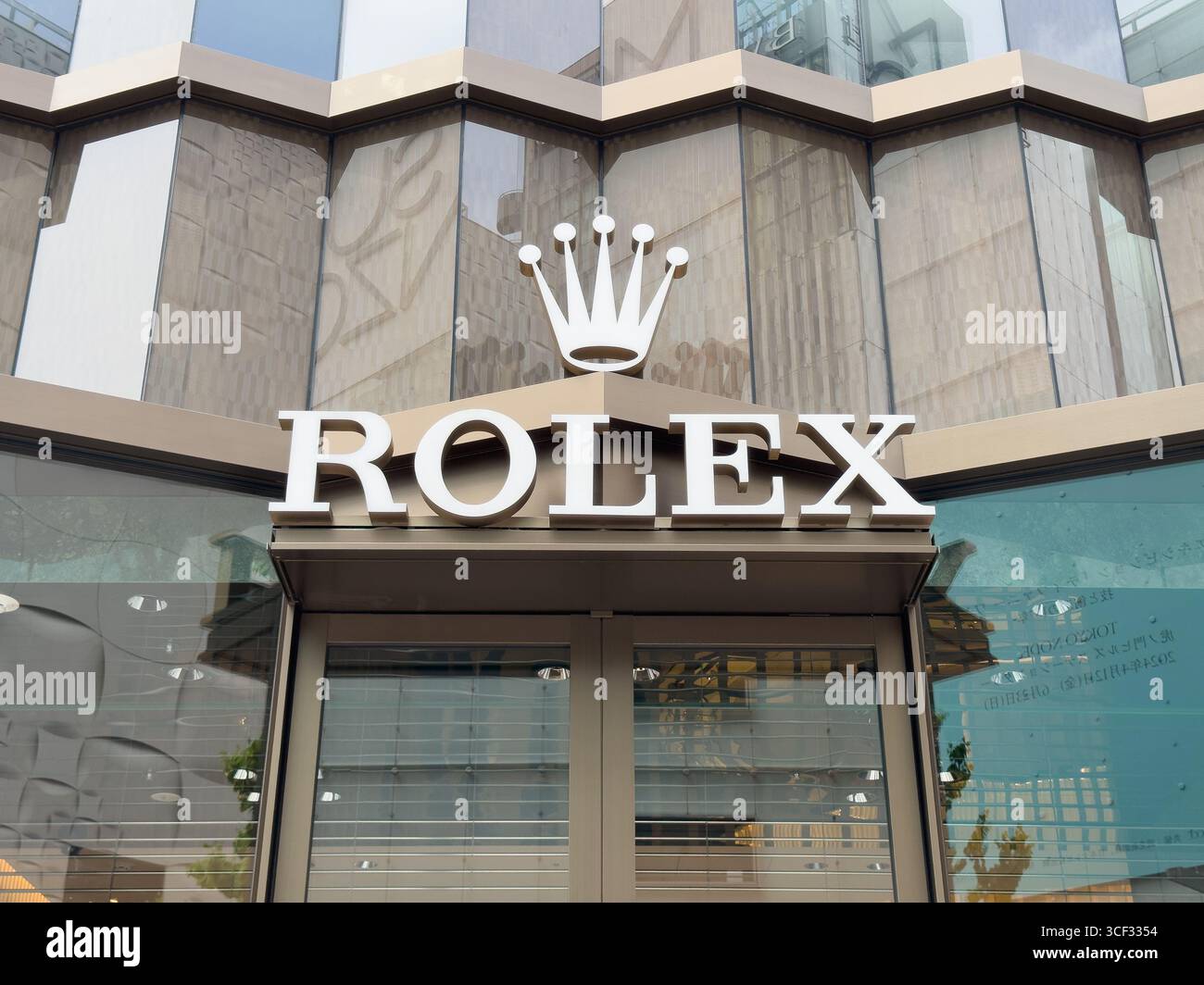 Rolex Ginza Flagship store in the new Rolex Tower in Ginza, the upscale shopping district of Tokyo, Japan. - Smartphone Captured Stock Image