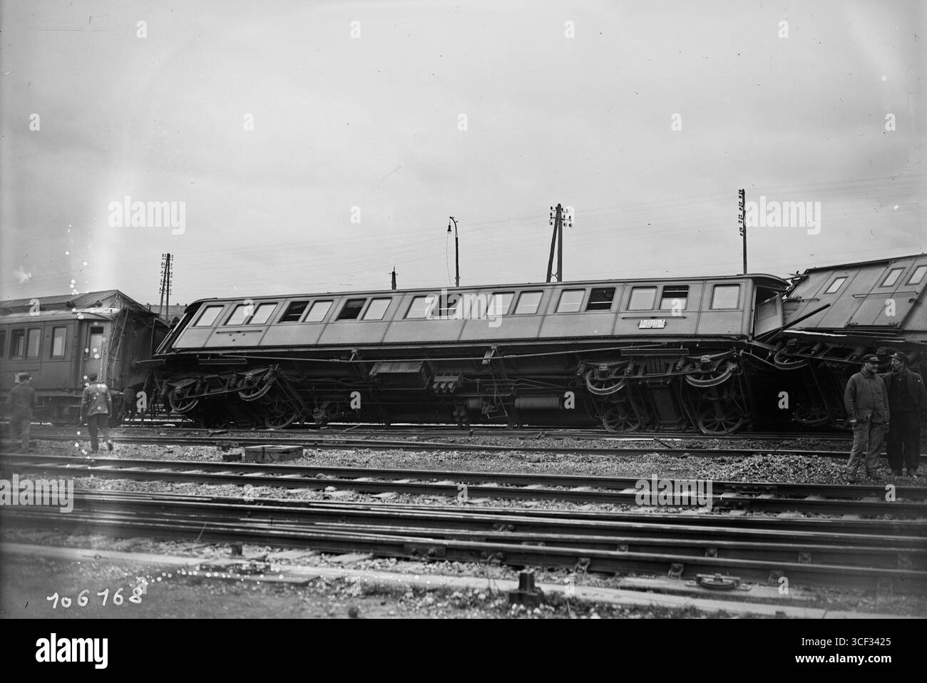 The railway disaster at Noisy on December 22, 1925, is depicted here showing overturned train cars. This image reflects the severity of the crash and the aftermath. Stock Photo