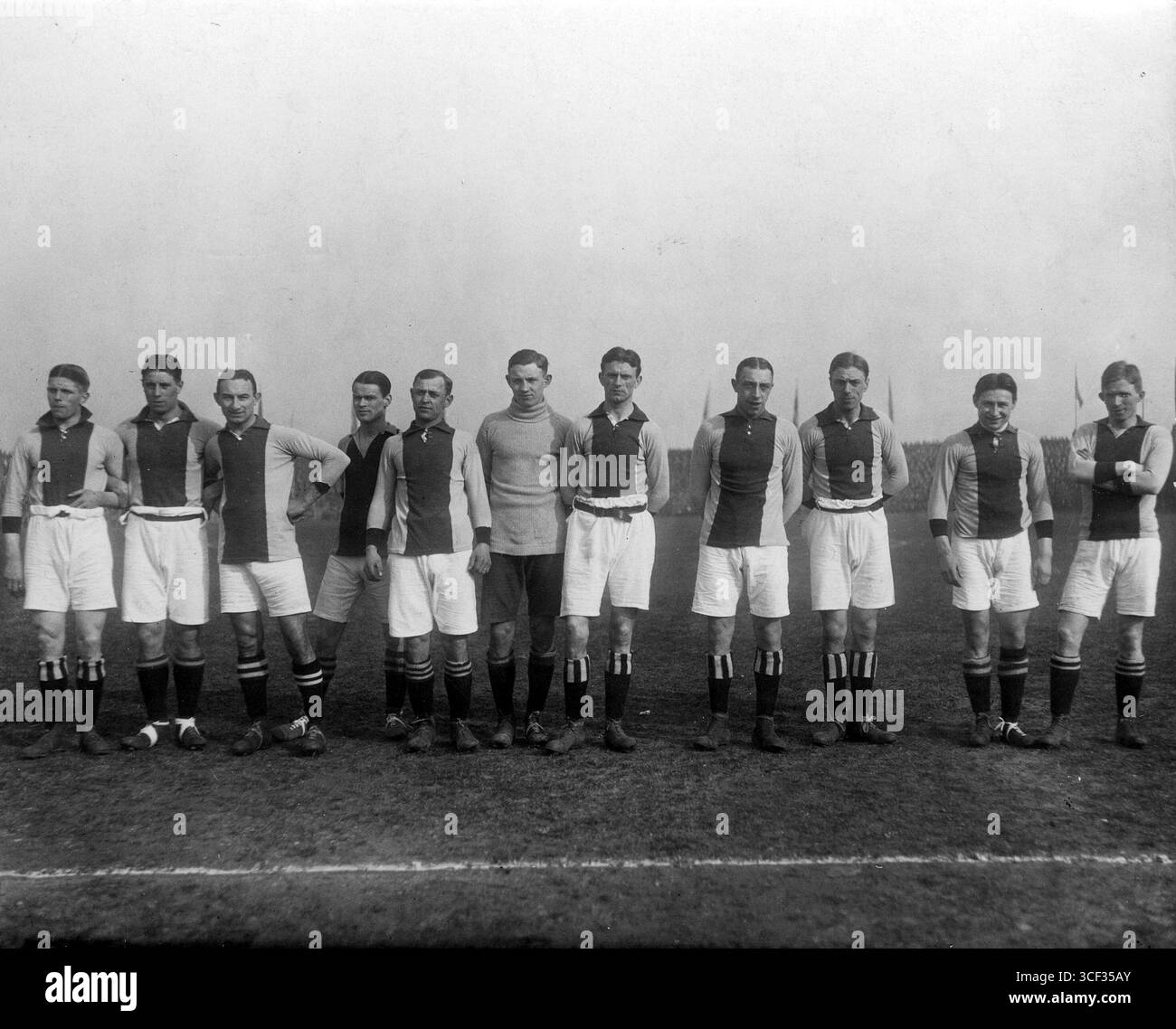 This photo taken on March 10, 1918, shows Ajax FC's team before their match against Blauw Wit. It commemorates their first Dutch league title during the 1917/1918 season. The final score was 0-0. Stock Photo