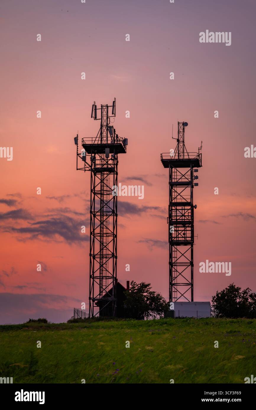 Golden hour cloudy sunrise sky top of Krusne mountains morning in Naklerov CZ 08 16 2025 Stock Photo
