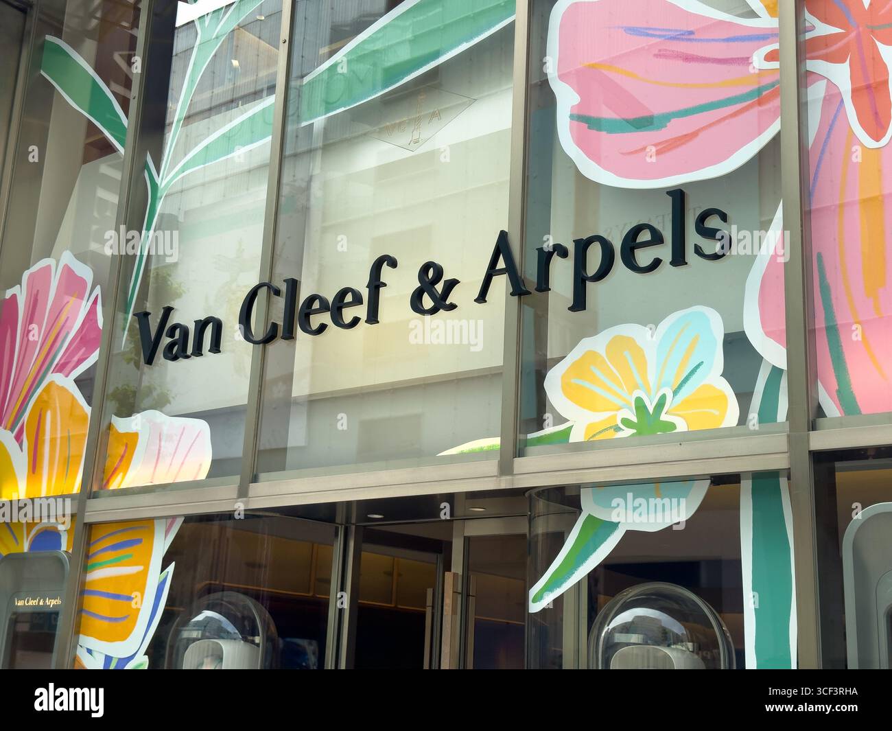 Van Cleef & Arpels, French luxury jewelry company in Ginza, the upscale shopping district of Tokyo, Japan. - Smartphone Captured Stock Image