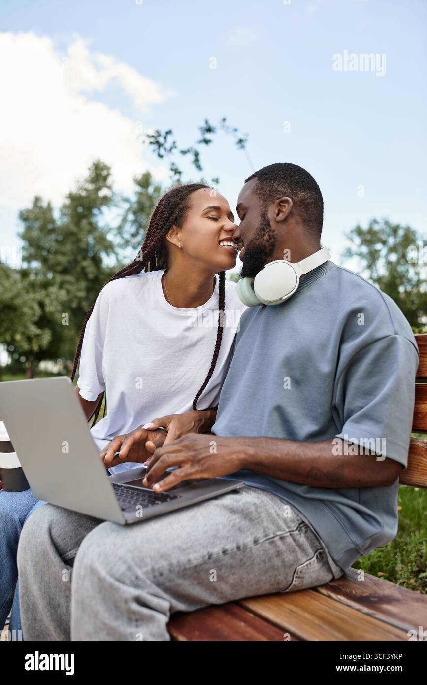 Young couple enjoys each others company on a beautiful day while walking outdoors. Stock Photo