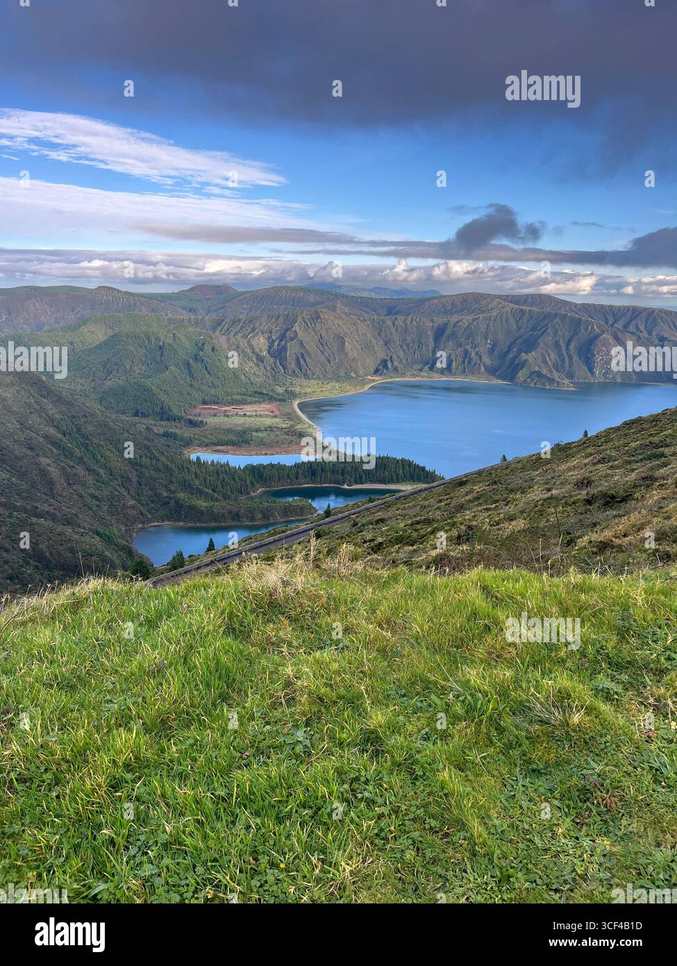 View of Lagoa do Fogo crater lake from a scenic viewpoint in São Miguel, Azores, Portugal. - Smartphone Captured Stock Image