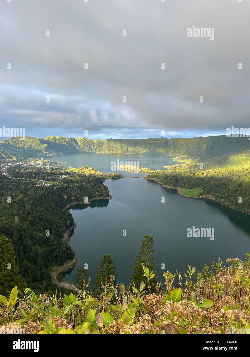 View of Sete Cidades crater lakes from a scenic viewpoint in São Miguel, Azores, Portugal. - Smartphone Captured Stock Image