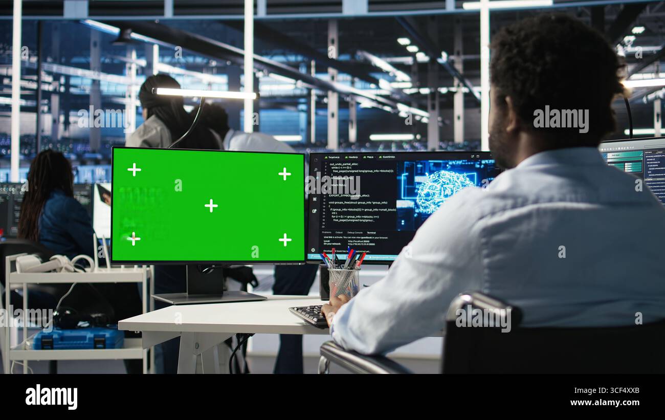 Data center admin in wheelchair using AI node tree software on green ...