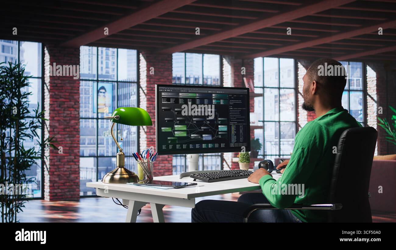African american engineer at home working on visual coding on terminal window, typing programming language and reviewing the notes tree. IT expert using debugging algorithms to fix errors. Camera B. Stock Photo