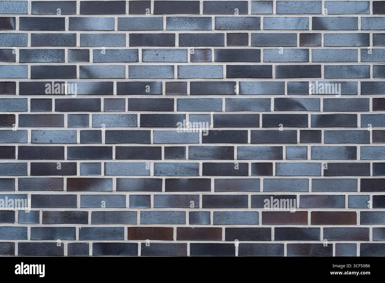 Wallpaper, area with clinker, blue-black Stock Photo
