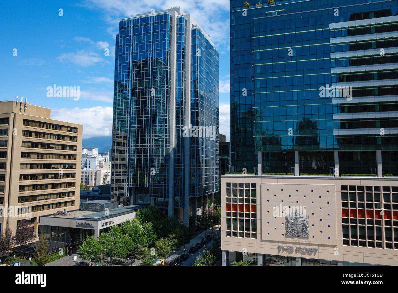 The Post Building with the new glass Amazon offices & other office ...
