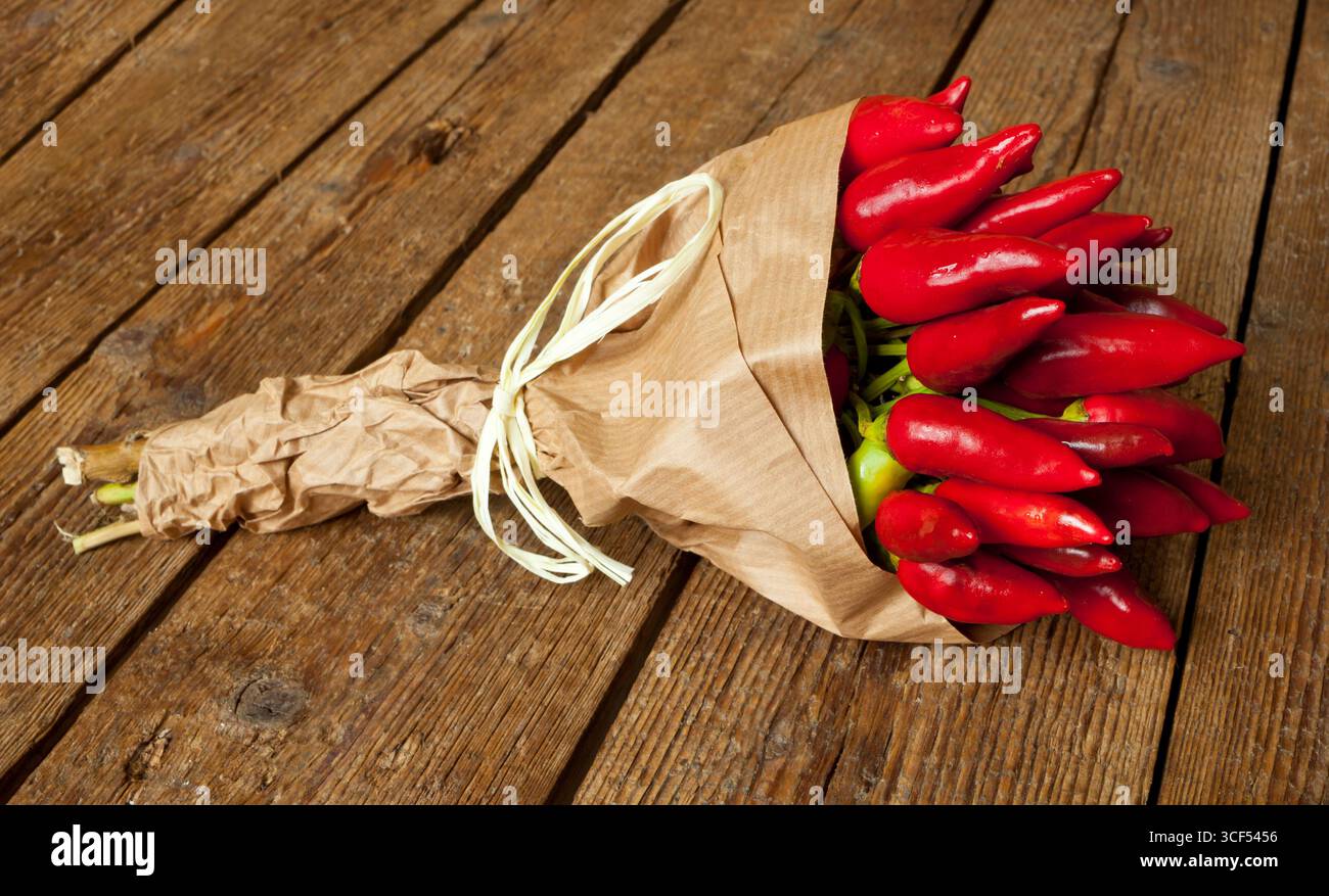Bunch of fresh small red hot pepper made in Salento, Puglia, Italy. Stock Photo