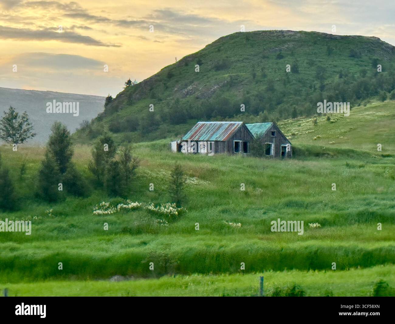 Golden Circle sunset over farm land. - Smartphone Captured Stock Image