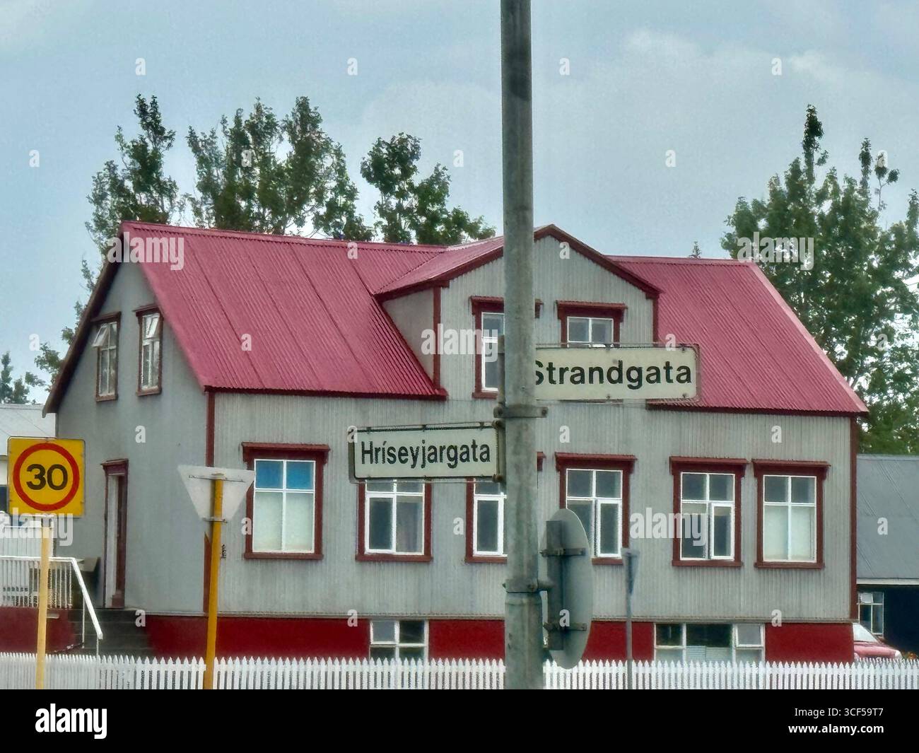 Intersection of Strandgata and Hriseyjargata streets in Akureyri. - Smartphone Captured Stock Image