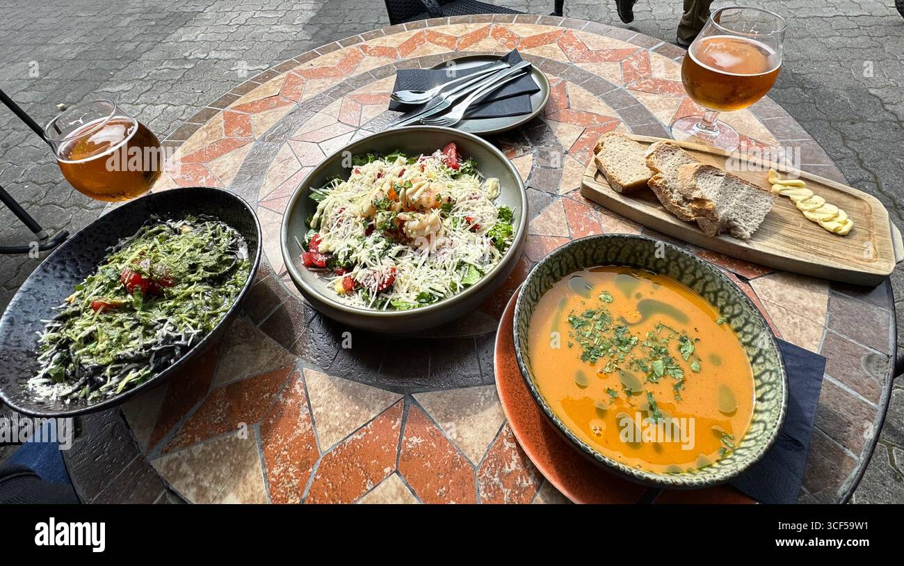Outdoor dining on delicious fish based food in Akureyri in the summertime. - Smartphone Captured Stock Image