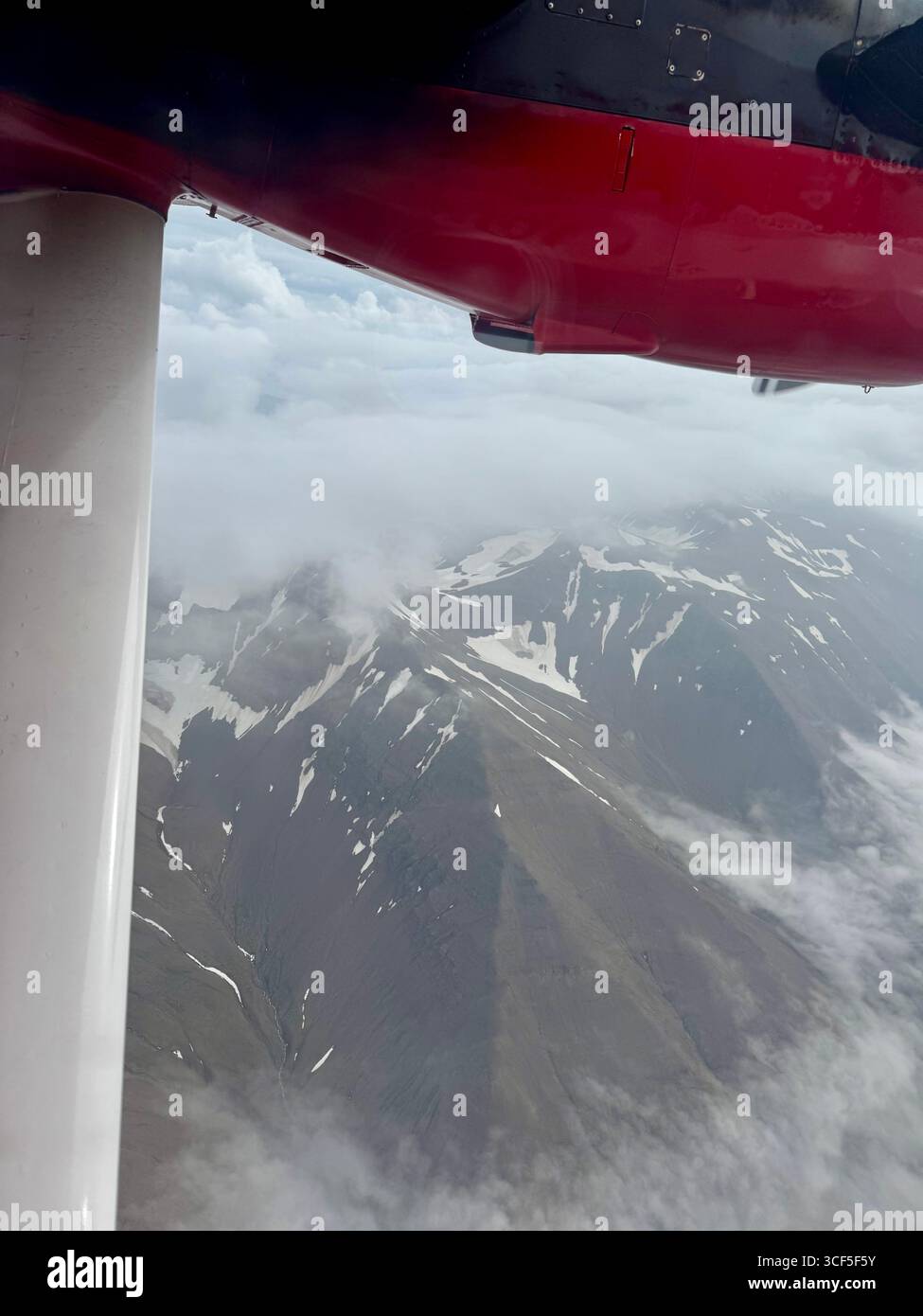 Remains of snow on the mountains of the Fjörður region, a peninsula area between Skjalfandi Bay and Eyjafjordur in north Iceland - Smartphone Captured Stock Image