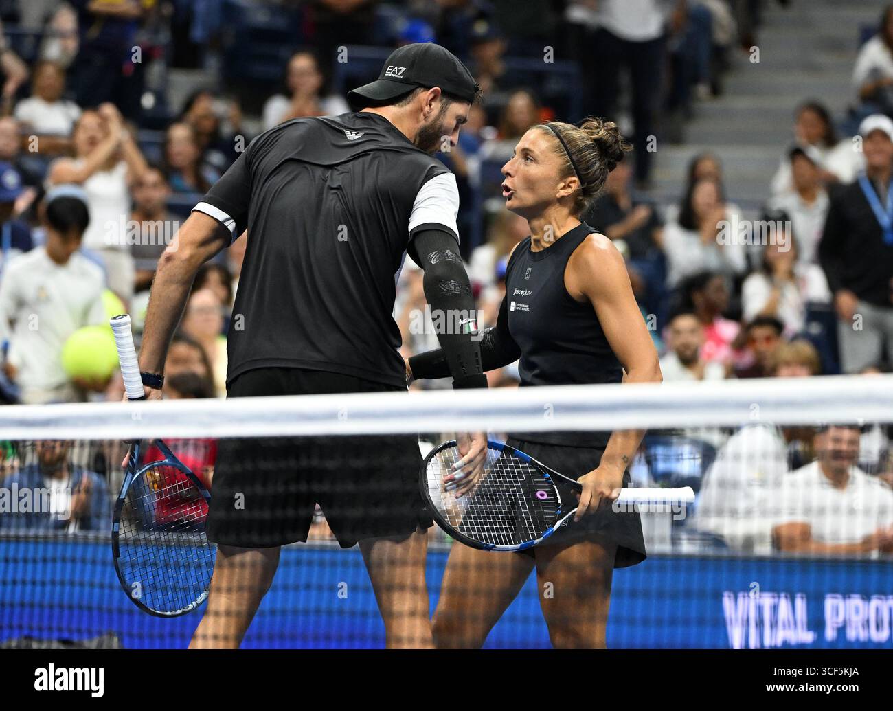 New York, United States. 20th Aug, 2025. Sara Errani and Andrea Vavassori react after defeating Danielle Collins and Christian Harrison during the Mixed Doubles Semi Finals on Arthur Ashe Stadium at the 2025 US Open Tennis Championship at the USTA Billie Jean King National Tennis Center in New York City on Wednesday, August 20, 2025 in New York City. Sara Errani and Andrea Vavassori react after defeating Danielle Collins and Christian Harrison 4-2-4-2 and advance to the finals. Photo by Larry Marano/UPI Credit: UPI/Alamy Live News Stock Photo