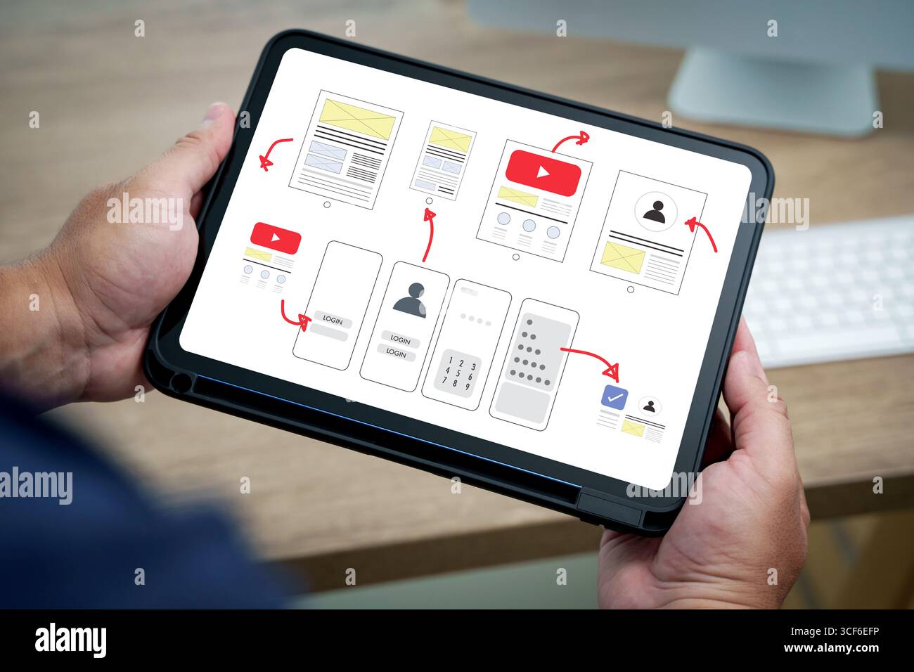 UX UI design process concept with close-up view of a designer holding a ...