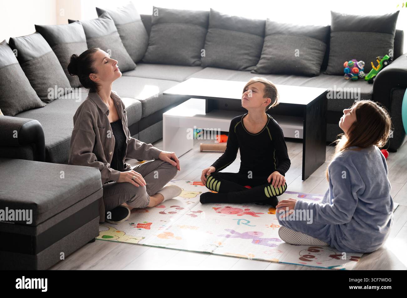 Mother two daughters engage hi-res stock photography and images - Alamy