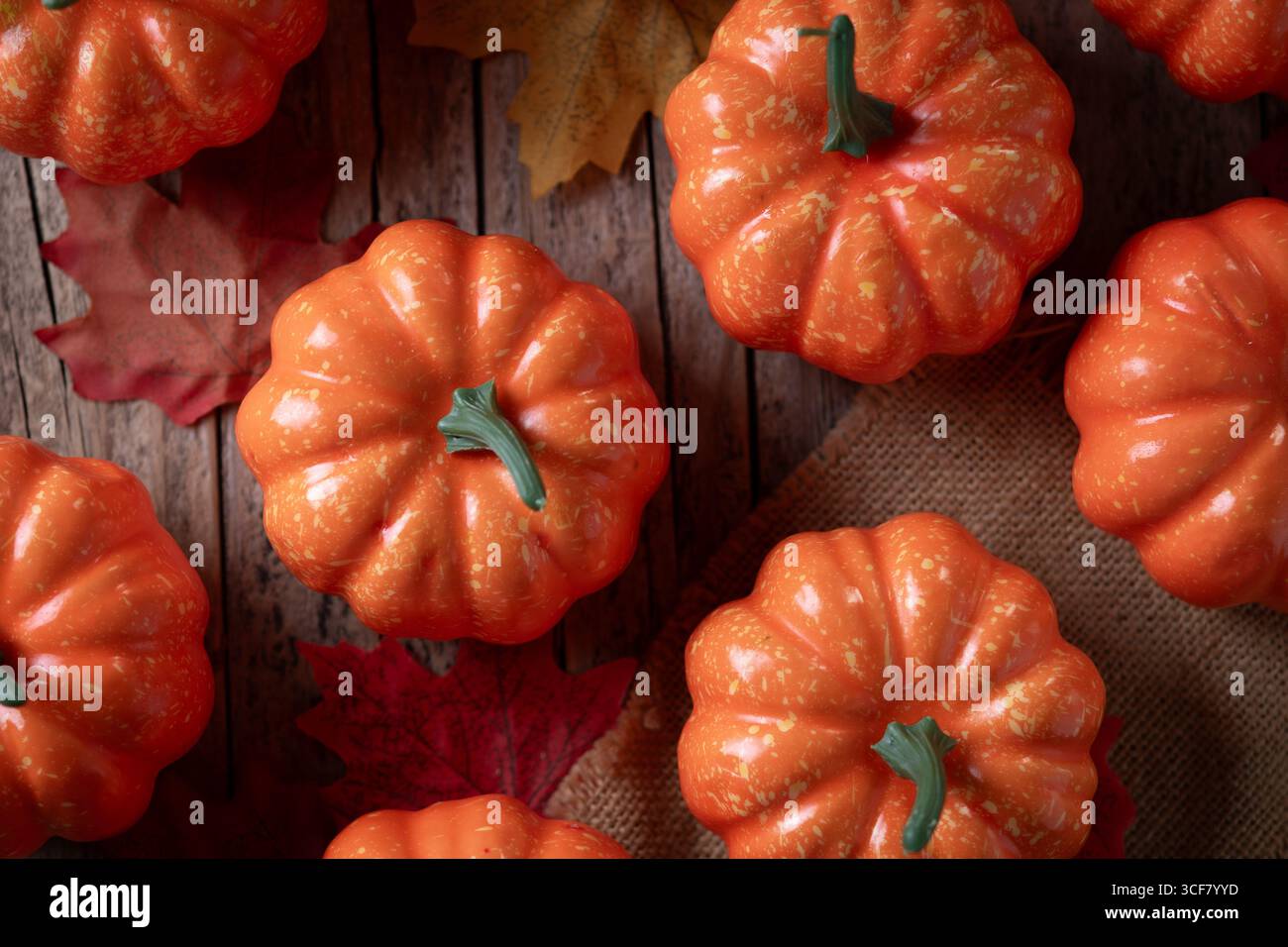 Autumn pumpkins background on rustic wooden table Stock Photo