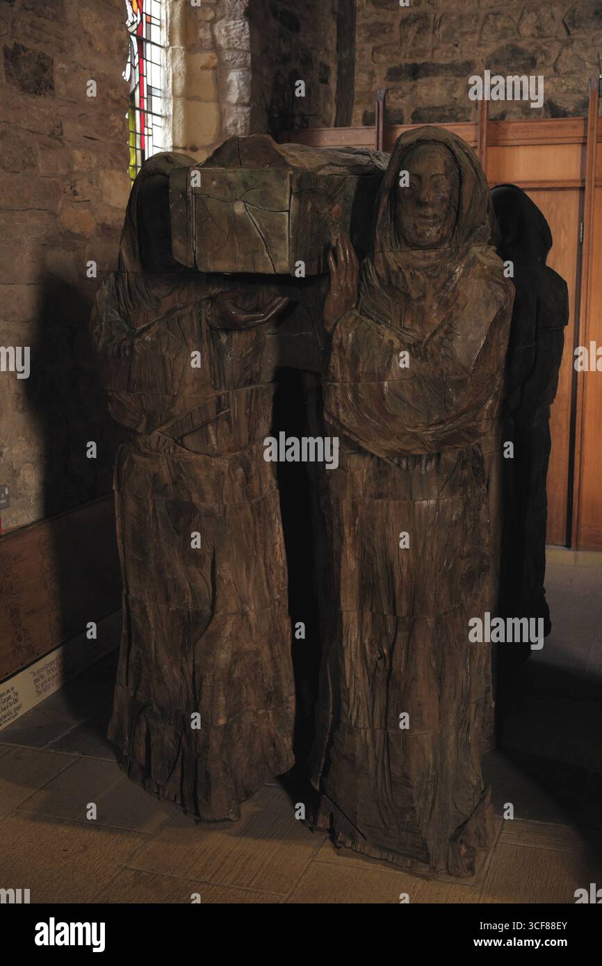 Sculpture by Fenwick Lawson depicting monks carrying St Cuthberts body ...