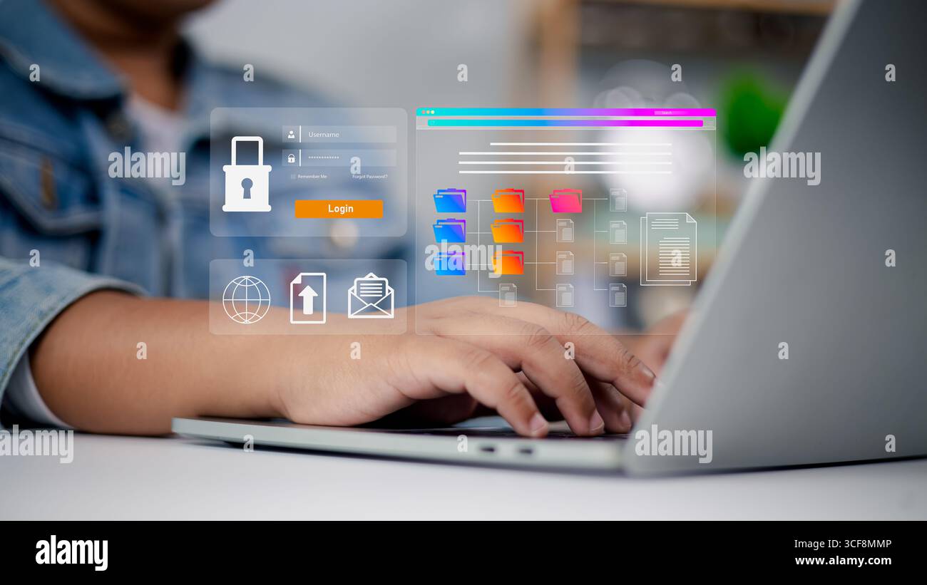 Data Security and Cloud Computing Interface. Person using a laptop with a futuristic interface showing data security, cloud computing, and digital doc Stock Photo