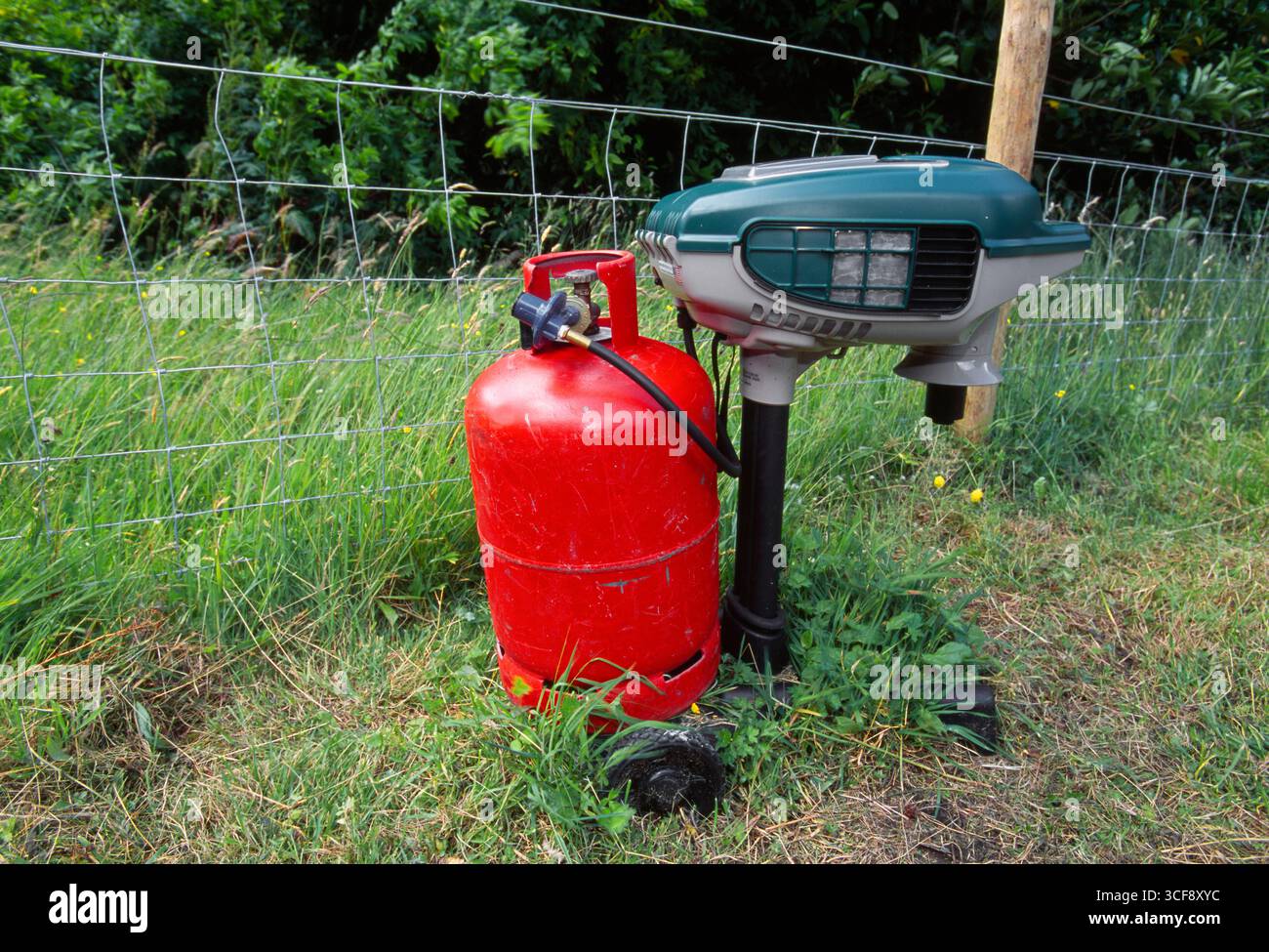 MosquitoTrap gas-powered unit that uses CO2 technology to attract and biting midges and mosquitos placed beside accommodation buildings. Stock Photo