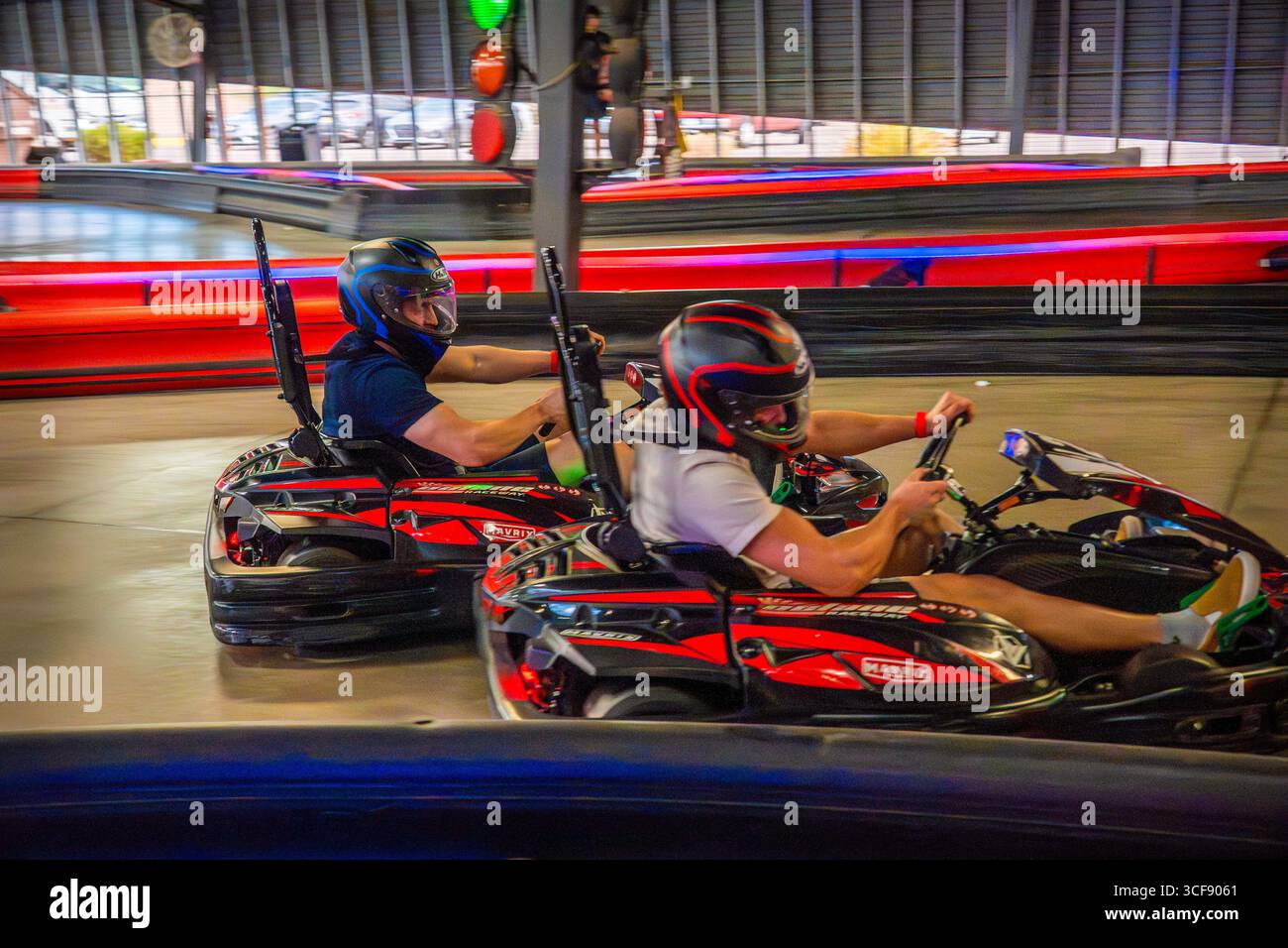 Phoenix, Arizona - August 17 2025: go karting with helmets Stock Photo ...