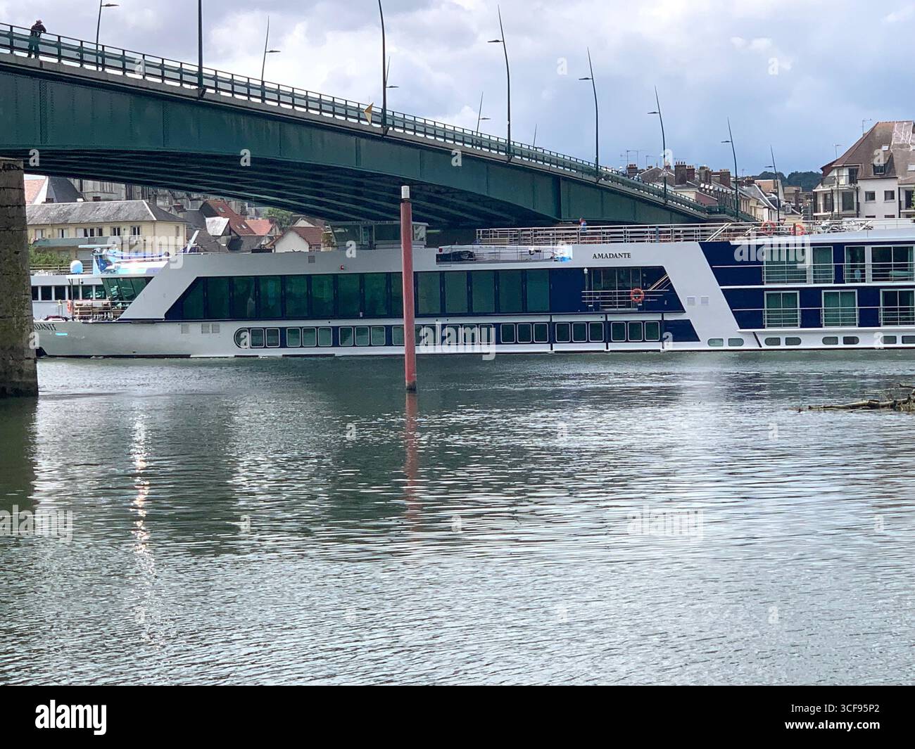 Park Promenade people place water  Berges De La Seine bike cycle tour tourists sign signs zebra crossing bridge arch arches stop sign artwork art - Smartphone Captured Stock Image