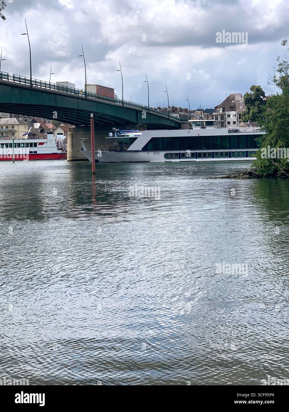 Park Promenade people place water  Berges De La Seine bike cycle tour tourists sign signs zebra crossing bridge arch arches stop sign artwork art - Smartphone Captured Stock Image