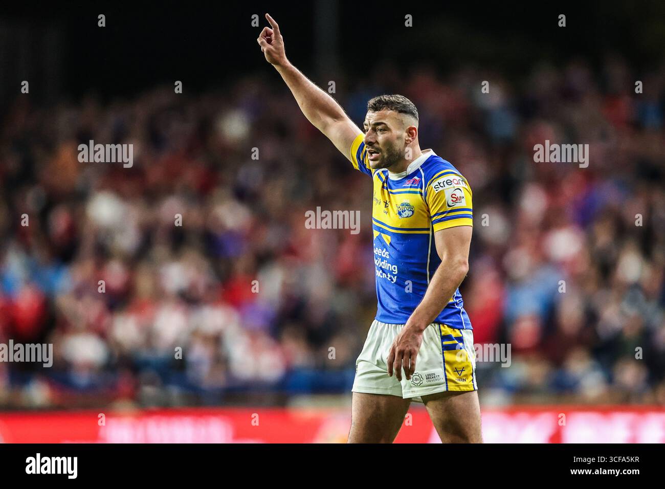 Jake Connor of Leeds Rhinos gives team mates instructions during the ...