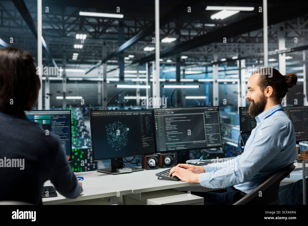 Data center system administrators monitoring AI systems, adjusting machine learning parameters. Server room admins enhancing artificial intelligence technology performance Stock Photo