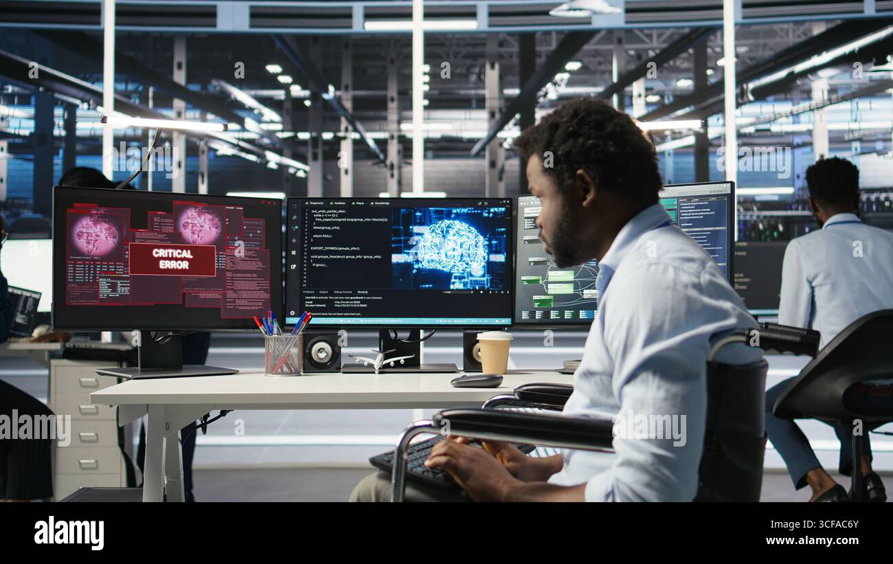 Overworked man in wheelchair upset by error warning popup while looking at server hub AI analytics metrics. Data center worker with disability irked by malfunction while using node tree tool, camera A Stock Photo