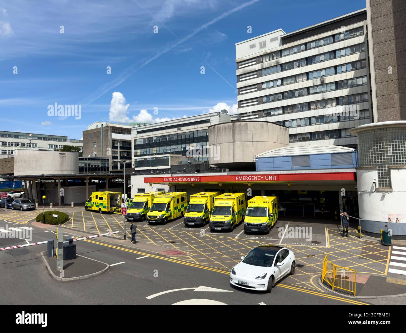 Emergency Unit entrance with ambulances parked outside University Hospital of Wales, Cardiff: Phillip Roberts - Smartphone Captured Stock Image