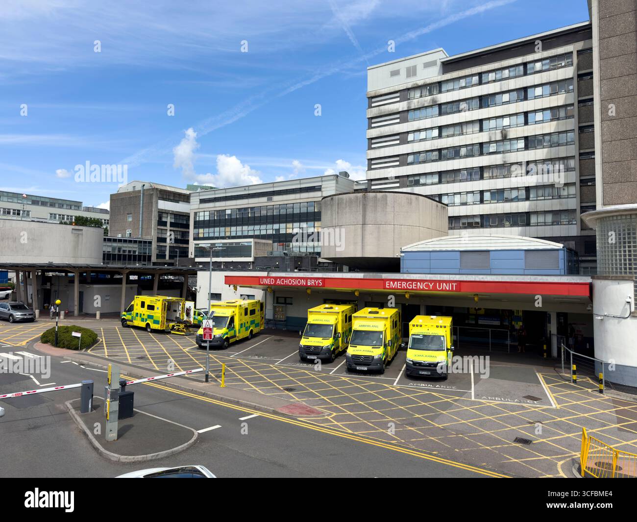 Emergency Unit entrance with ambulances parked outside University Hospital of Wales, Cardiff: Phillip Roberts - Smartphone Captured Stock Image