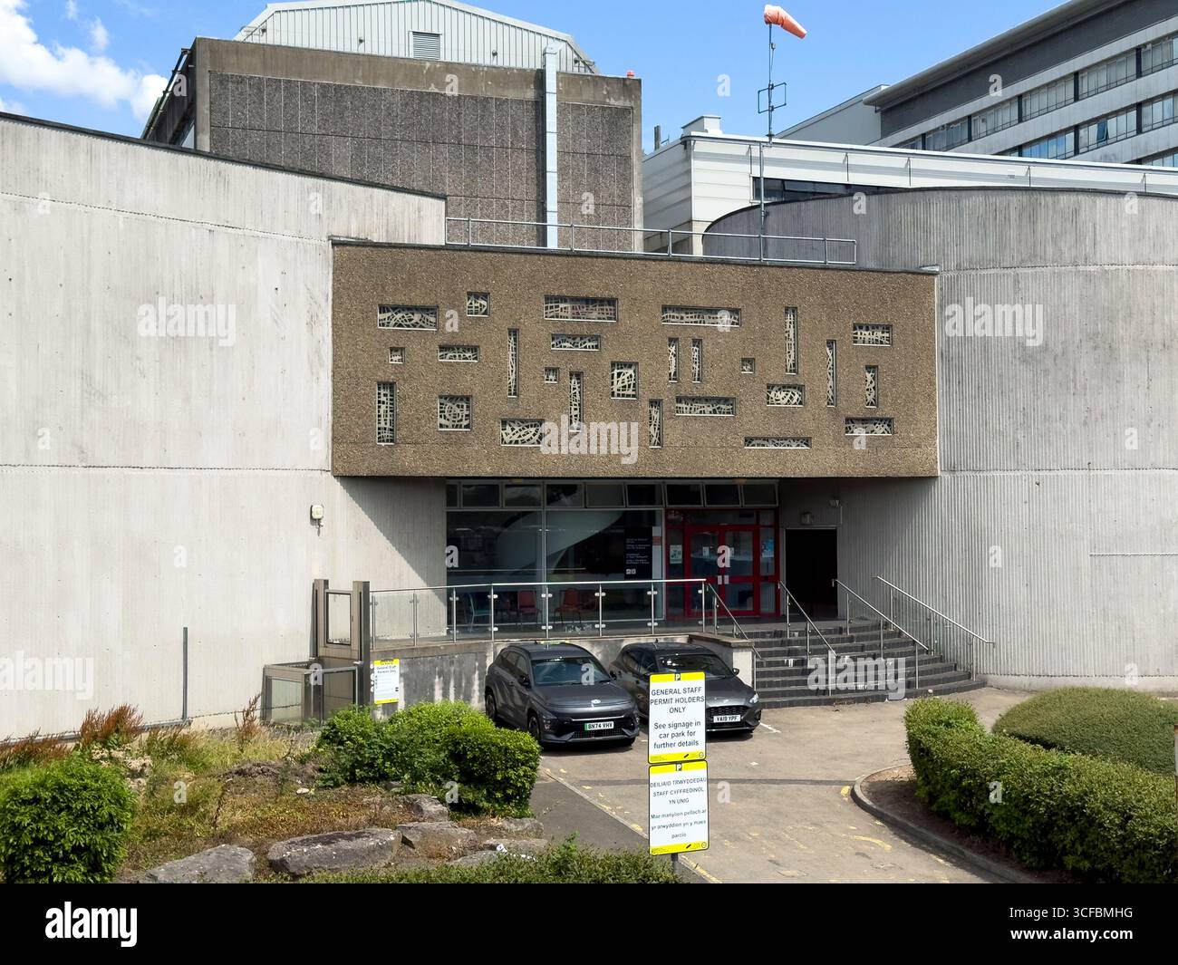 Emergency Unit entrance with ambulances parked outside University Hospital of Wales, Cardiff: Phillip Roberts - Smartphone Captured Stock Image