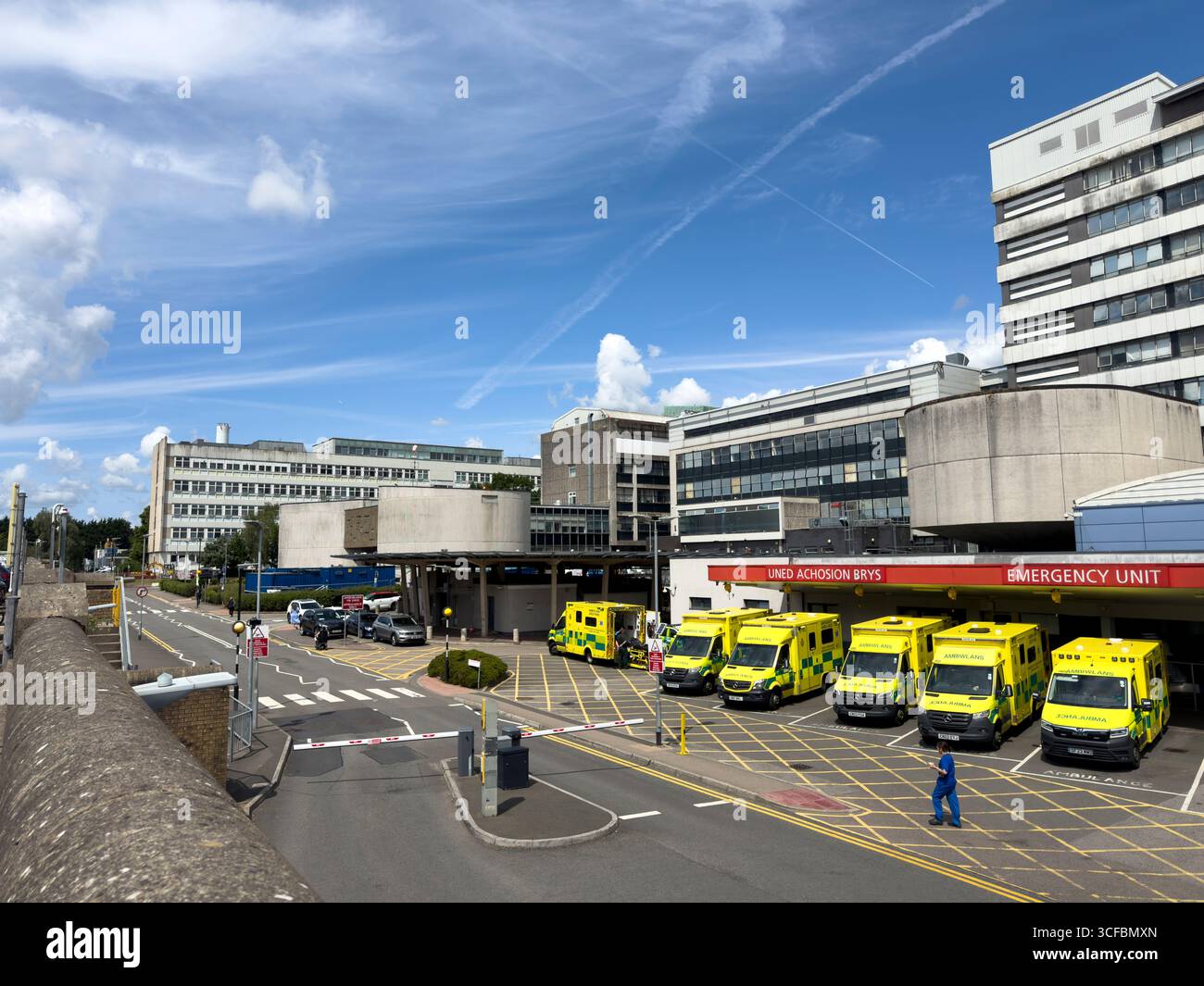 Emergency Unit entrance with ambulances parked outside University Hospital of Wales, Cardiff: Phillip Roberts - Smartphone Captured Stock Image
