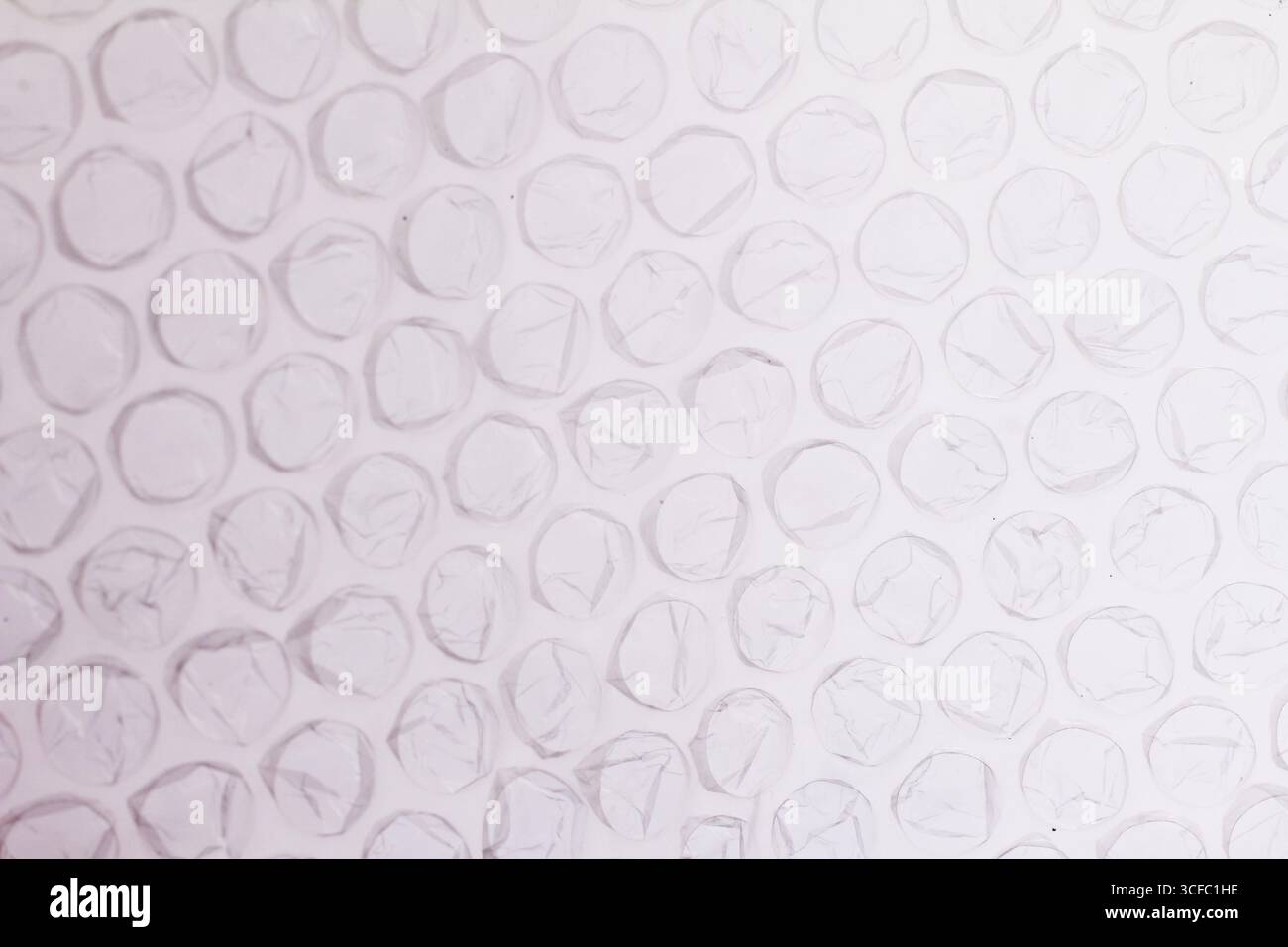 White plastic bubble wrap texture, close-up view. Stock Photo