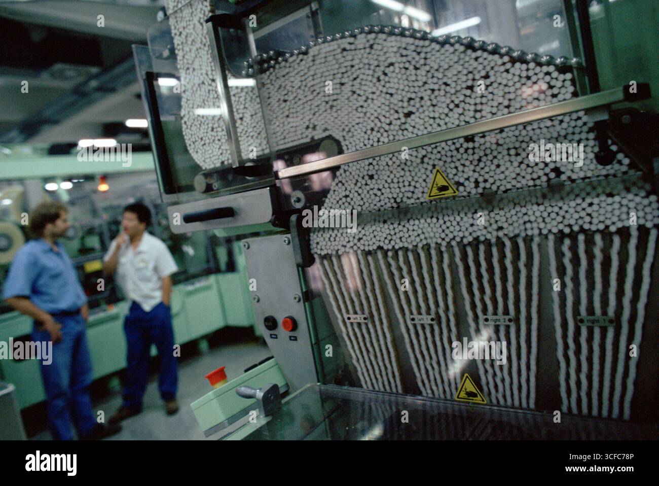 A cigarette and tobacco manufacturing machine and facility in China owned by the Hong Ta Group Stock Photo