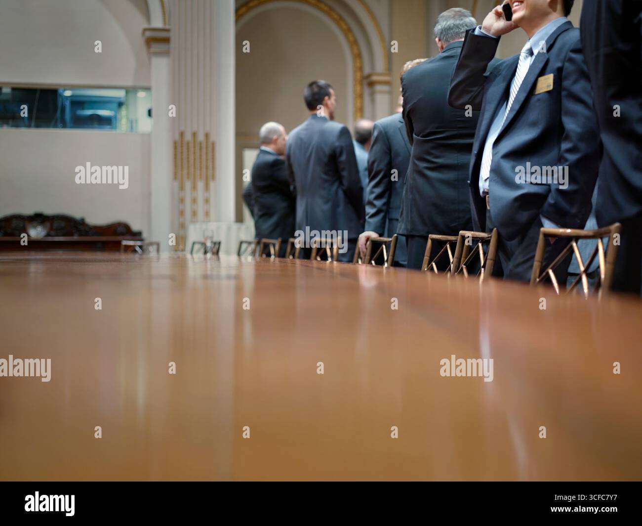 Businessmen inside a board room Stock Photo