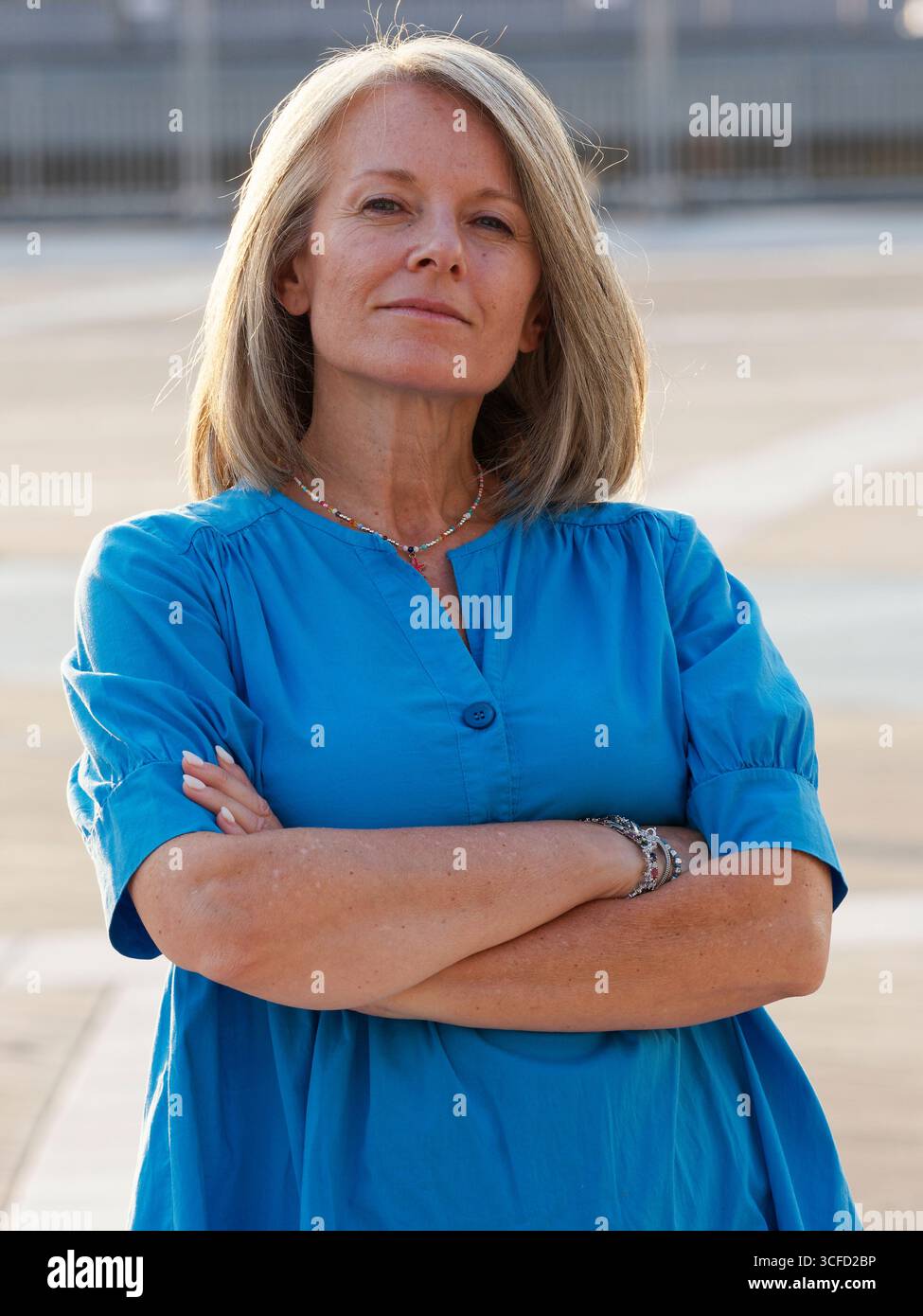 Woman in blue dress outdoors hi-res stock photography and images - Alamy