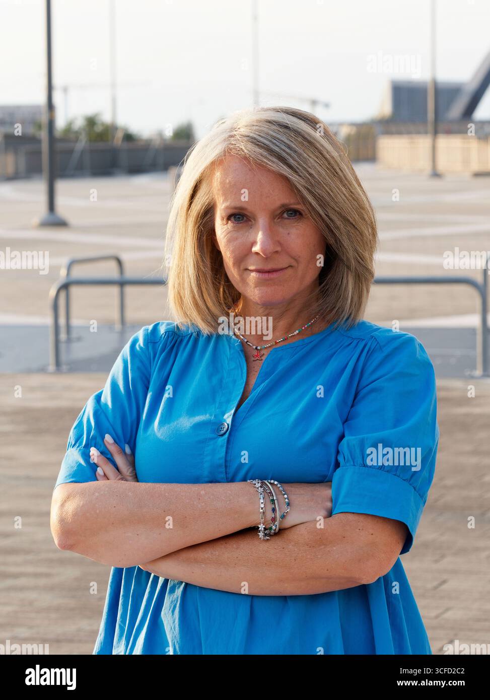 Woman in blue dress outdoors hi-res stock photography and images - Alamy