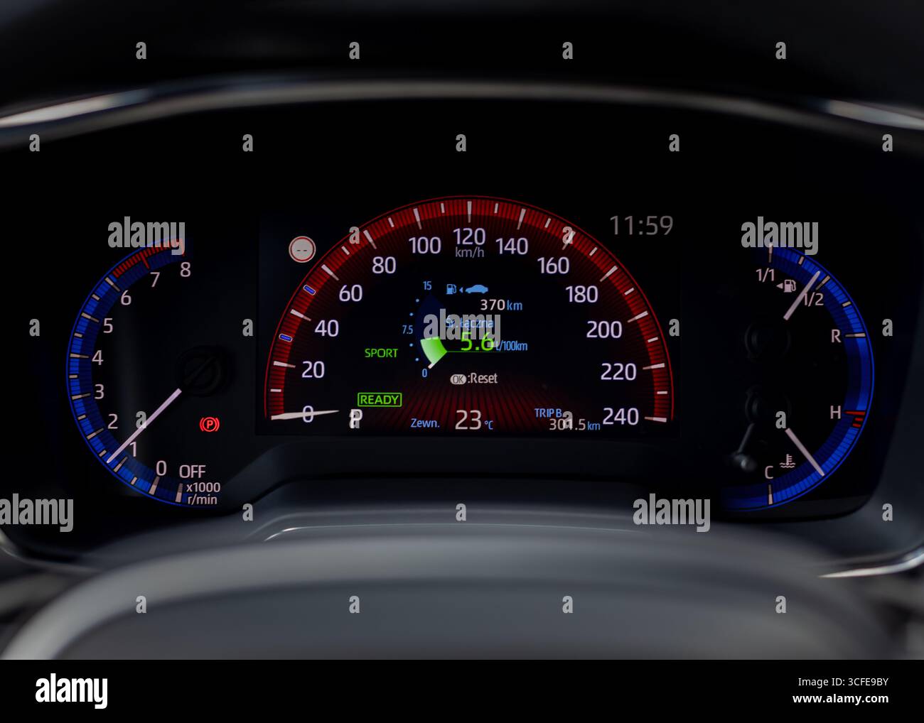 Modern car dashboard with speedometer tachometer and digital display ...