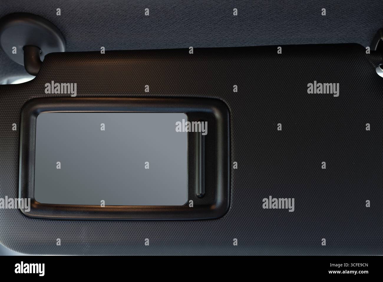 Car sun visor mirror close-up Stock Photo