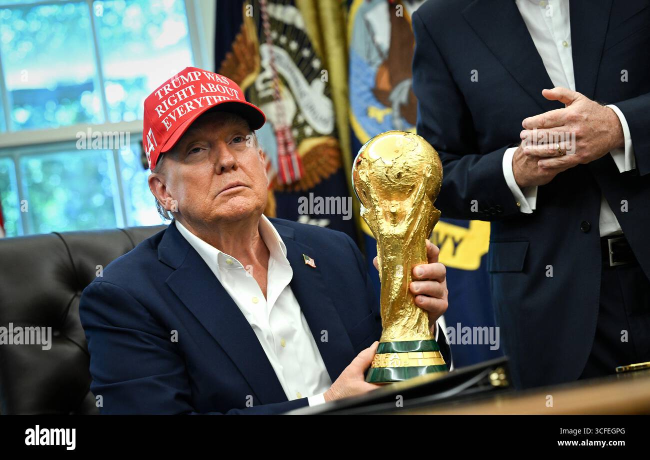 president-donald-trump-holds-the-fifa-world-cup-trophy-after-announcing