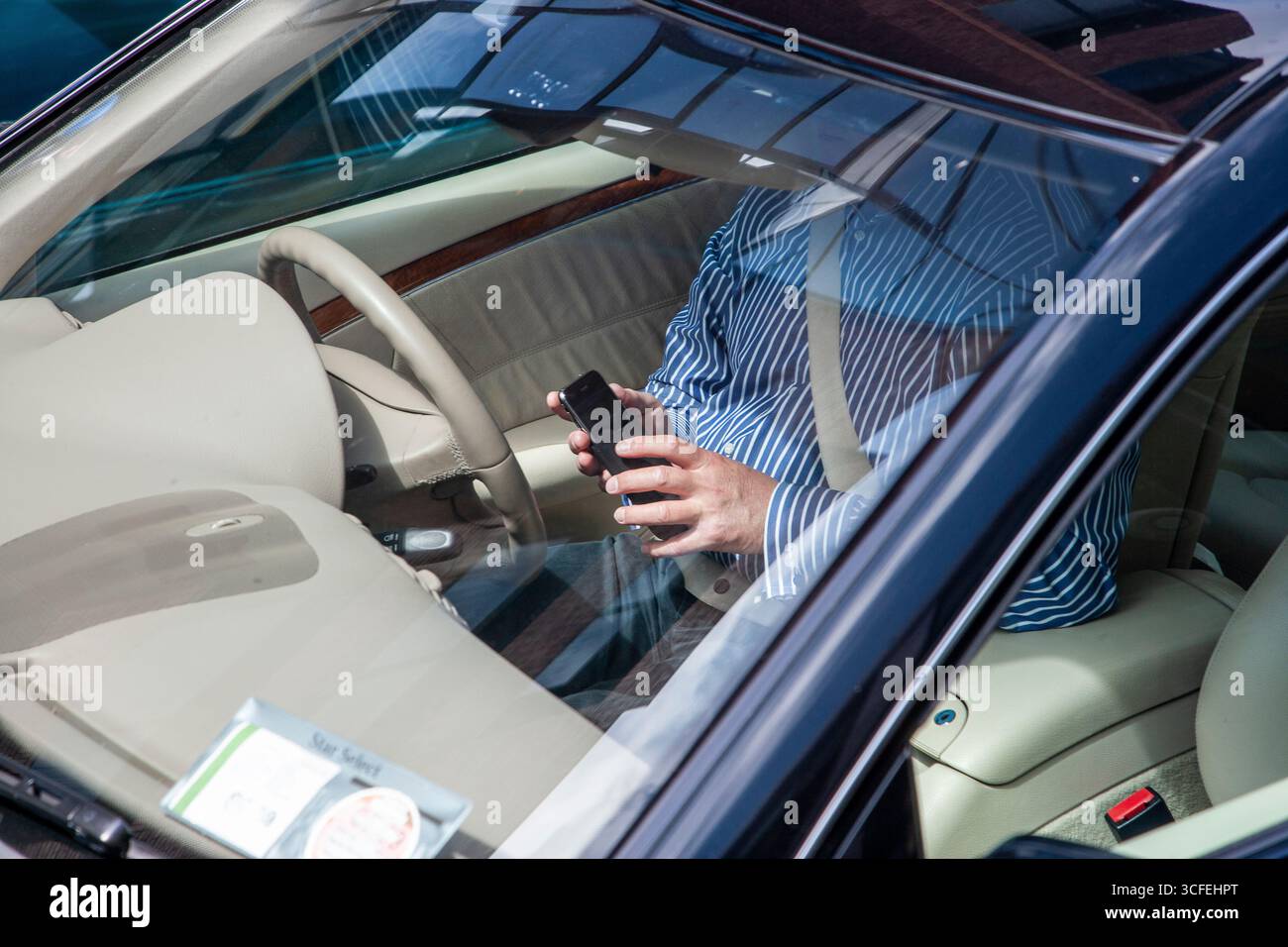 using phone in car Stock Photo