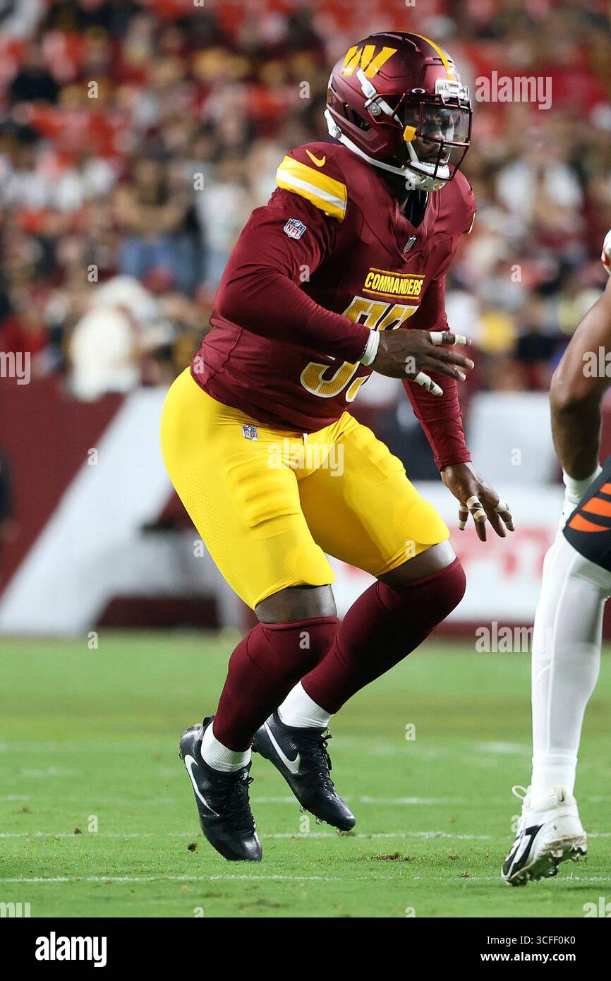 Washington Commanders linebacker Kain Medrano (56) rushes during an NFL ...