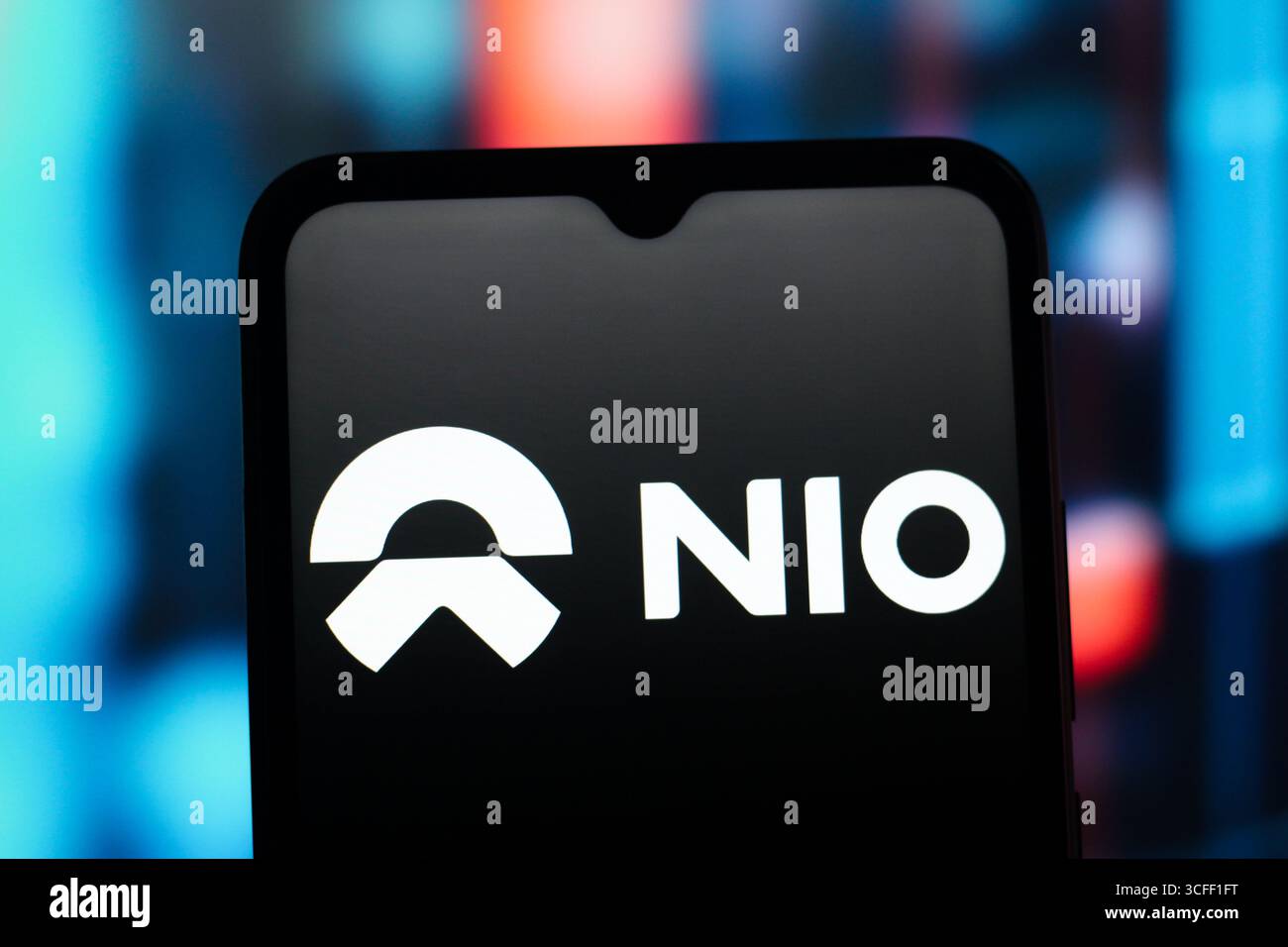 In this photo illustration, the Nio logo is seen displayed on a ...