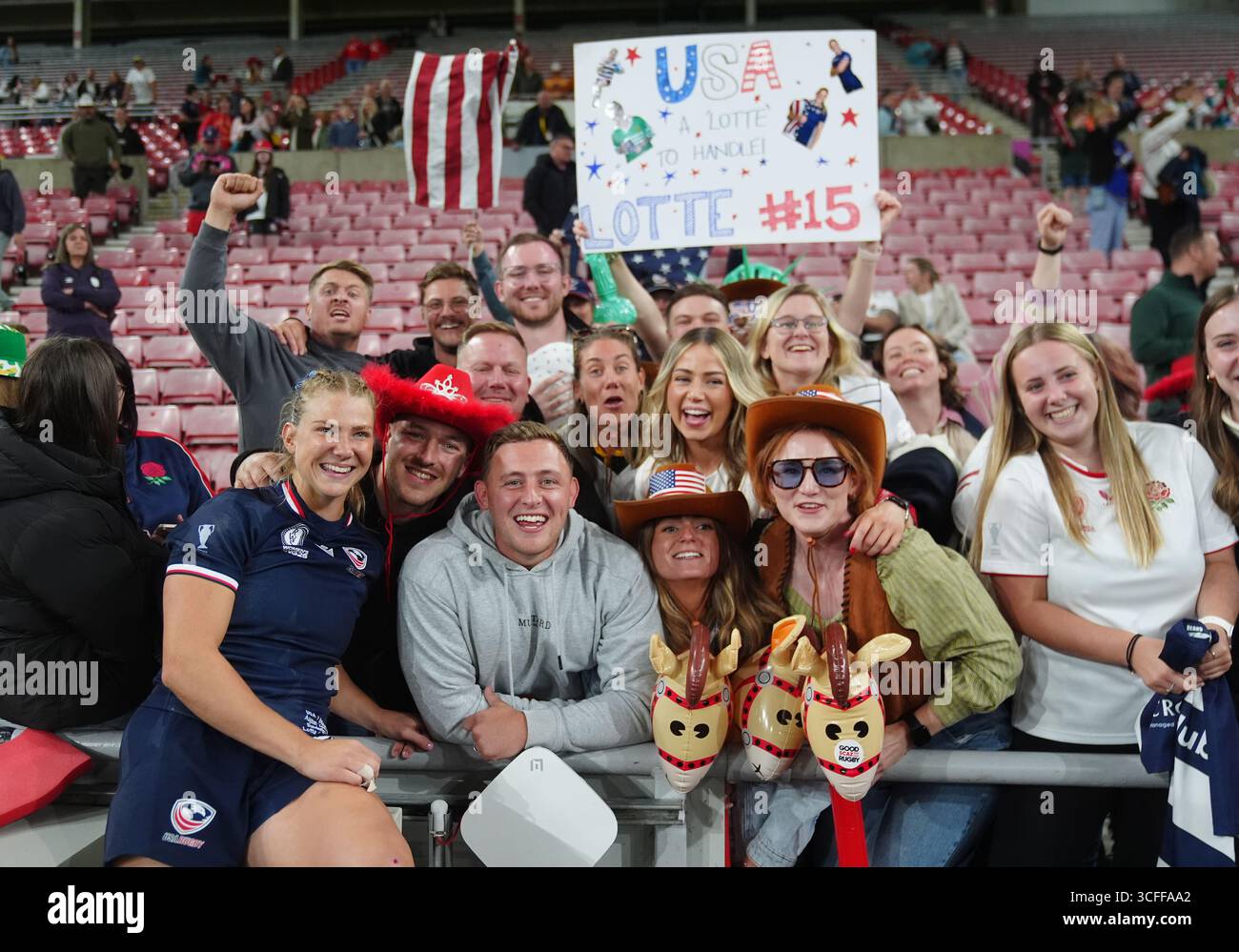 USA's Lotte Sharp (left) poses for a photo with fans after the Women's ...