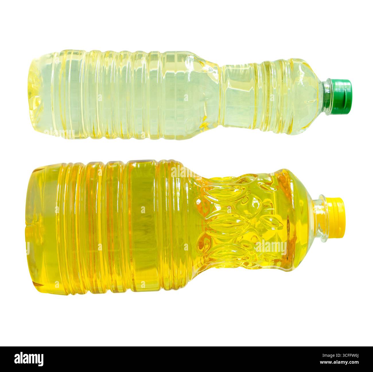 Two transparent plastic bottles of vegetable oil in palm and soybean ...